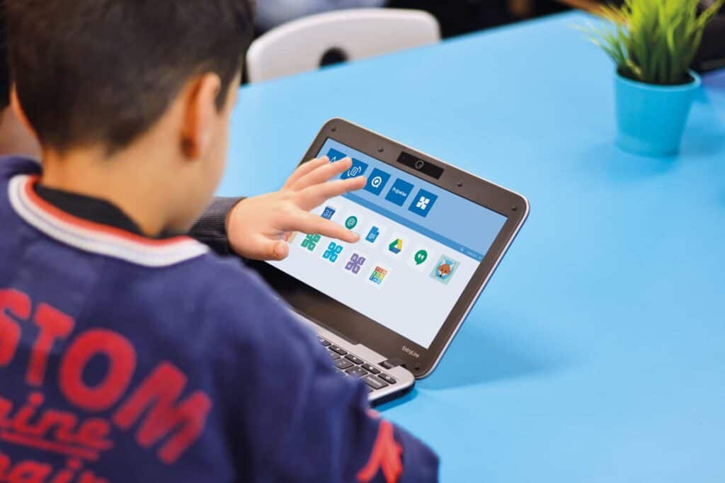 A child touch laptop screen monitor