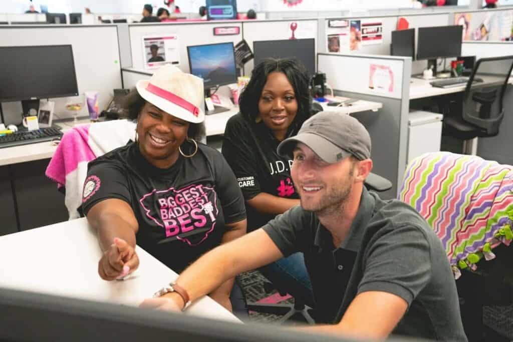 T-Mobile team member working together in the office