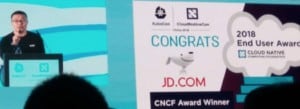 A gentleman representing JD.com giving speech for being 2018 CNCF end user award winner