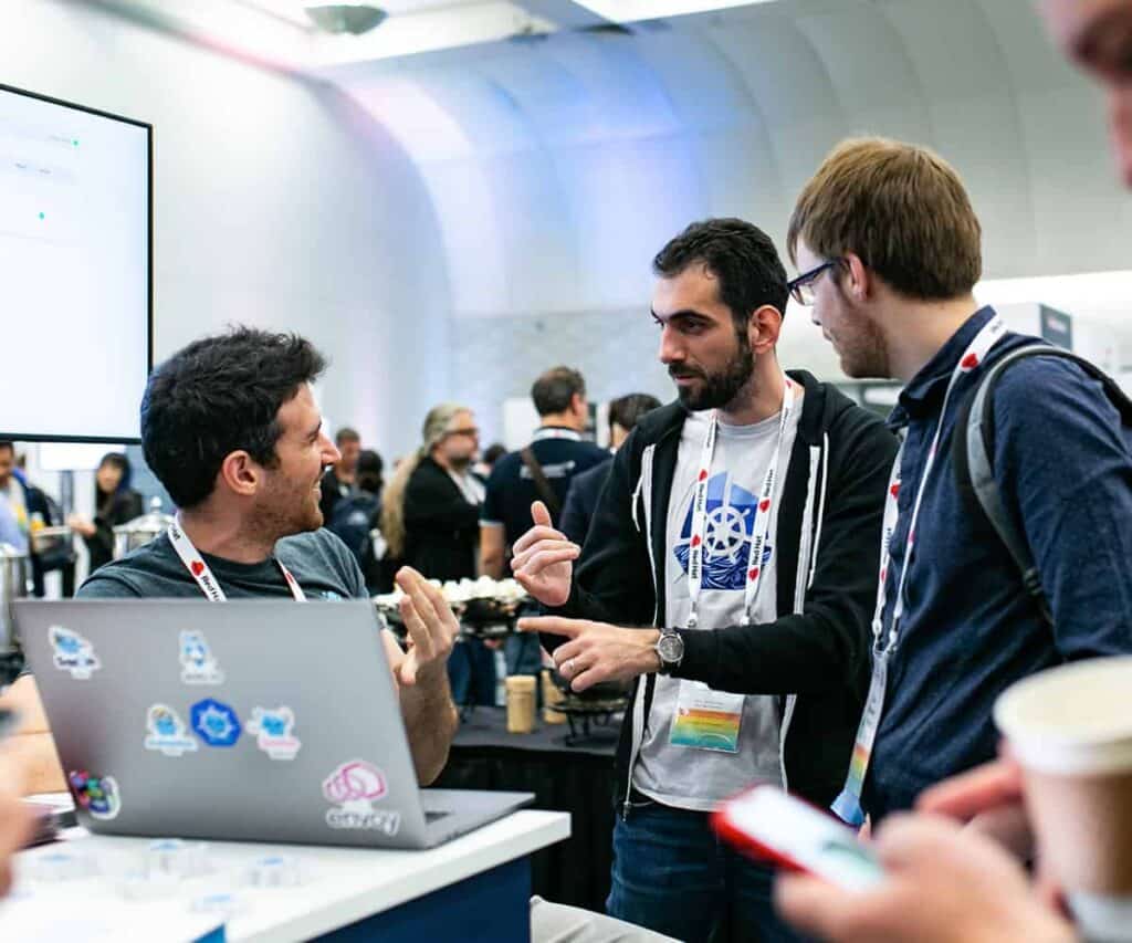 Men talking at a conference