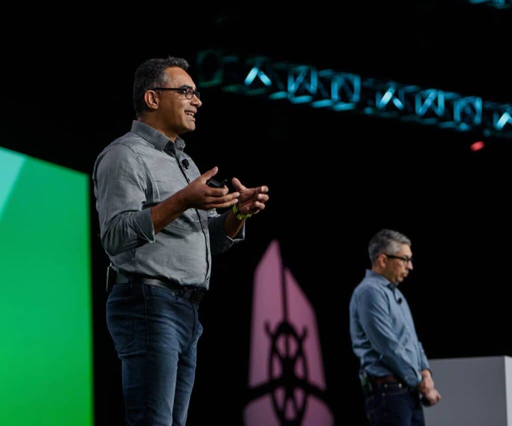 A man speaking at a conference