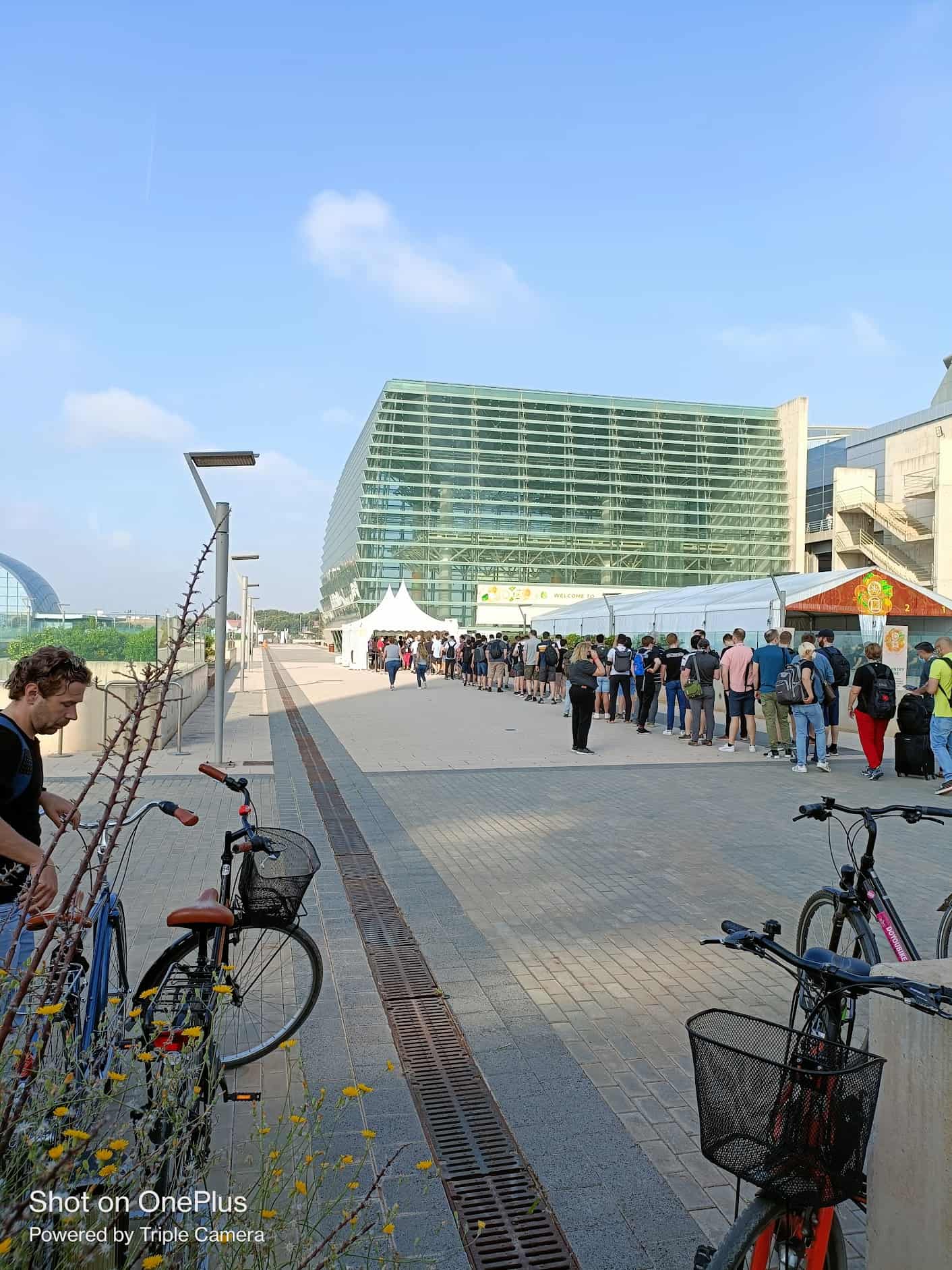 People queueing outside the building to enter KubeCon + CloudNativeCon day 3