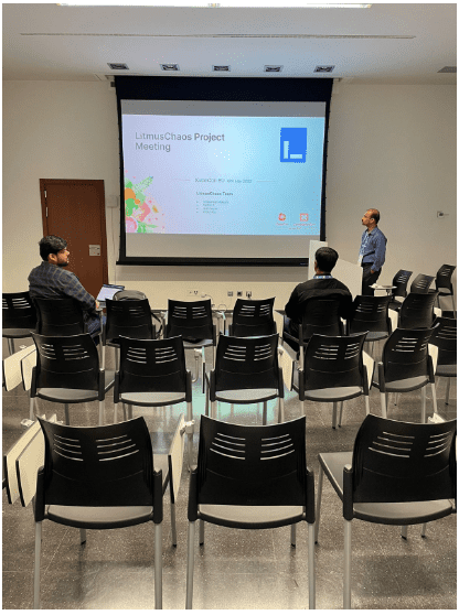 A gentleman presenting LitmusChaos Project Meeting in front of 2 gentlemen