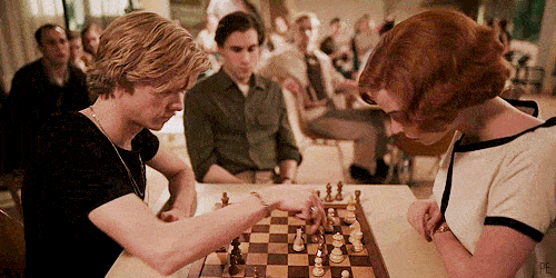 Queen of Gambit GIF showing a gentleman - Benny Watts compete towards a lady - Beth Harmon