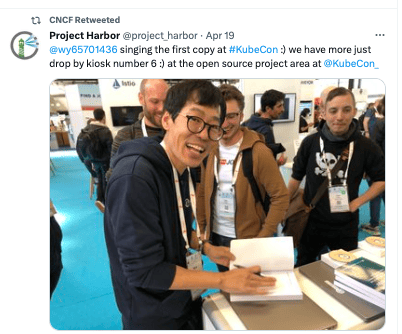 Screenshot of CNCF Retweeted Project Harbor "@wy65701436 singing the first copy at #KubeCon :) we have more just drop by kiosk number 6 :) at the open source project are at @KubeCon"