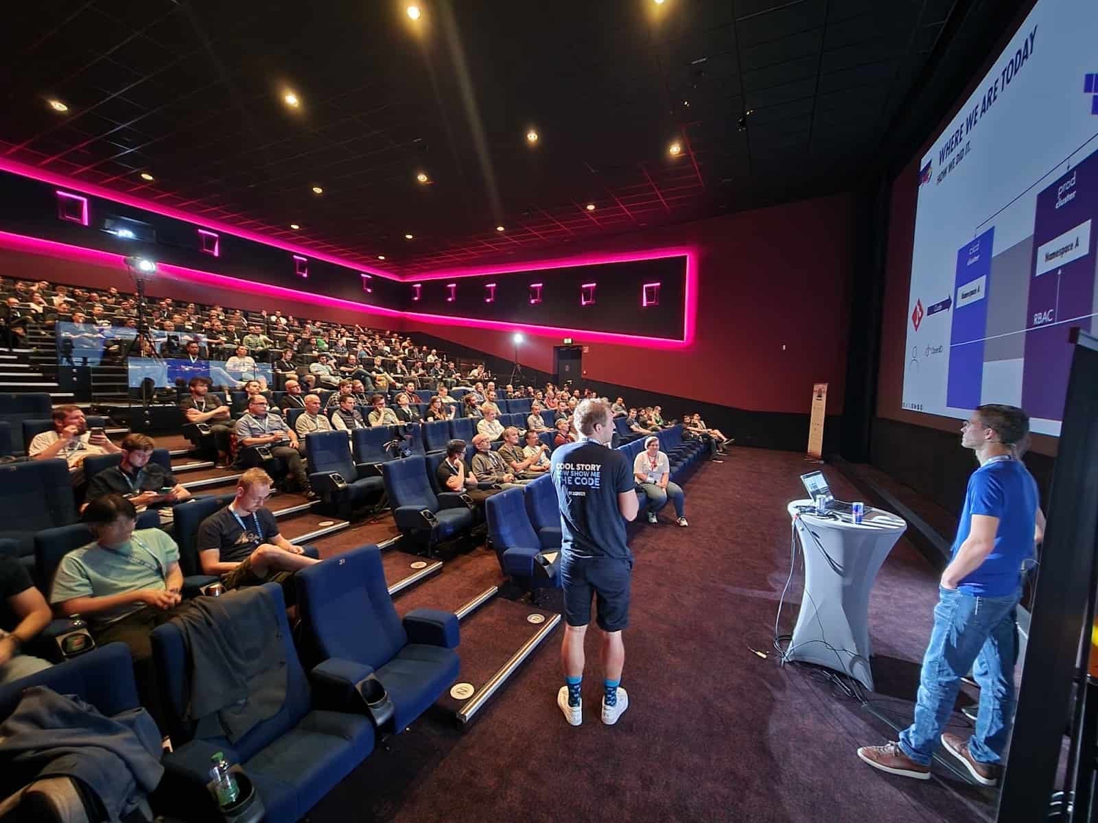 Participants watching a speaker talk on Kubernetes Community Days Austria 2023