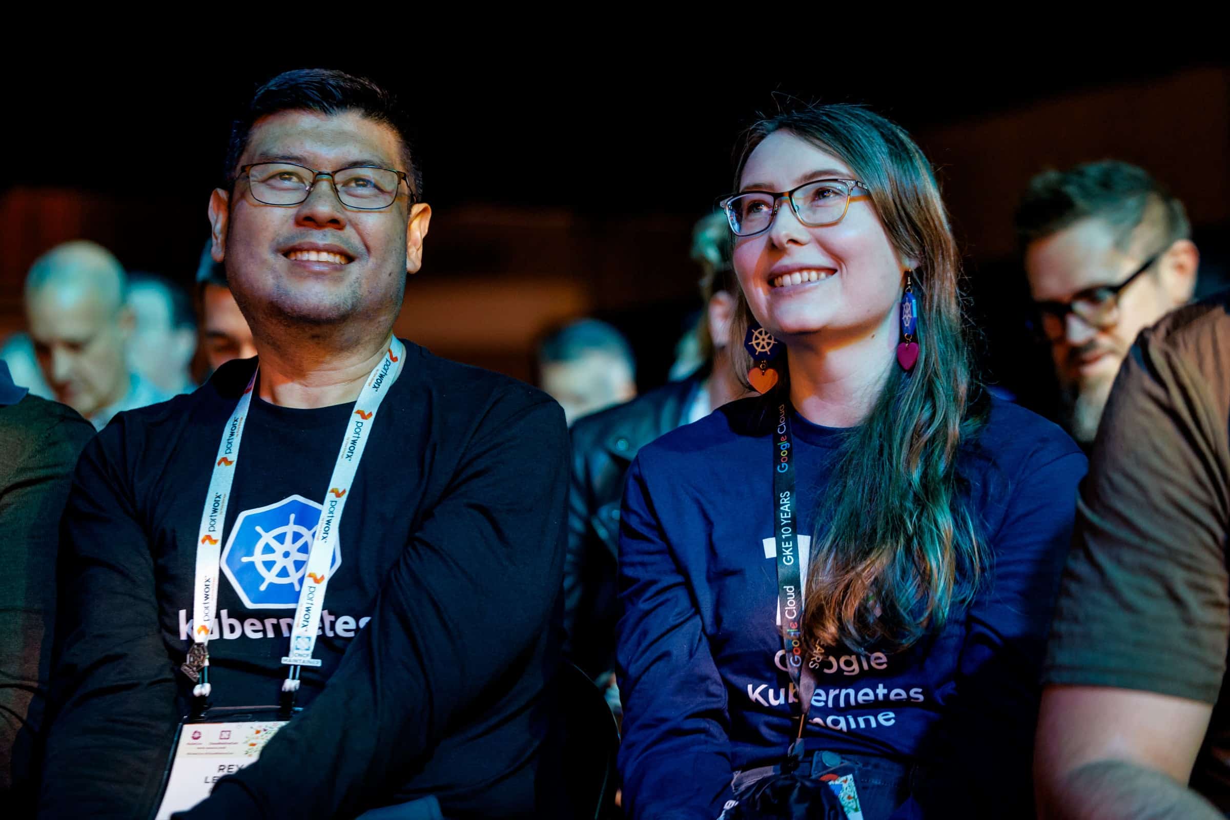 man and woman at a conference