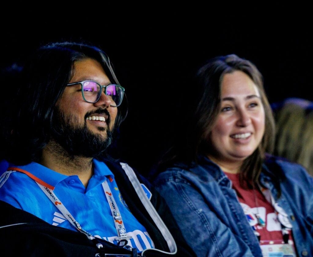 man and woman at conference