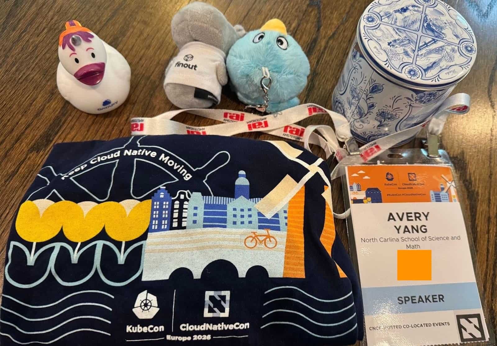 Avery's swag from KubeCon EU